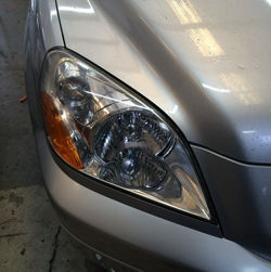 Un-Fogged Headlight Lens.